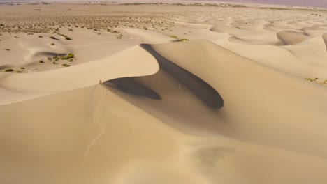 aerial drone footage of the sand dunes in death valley, california, usa