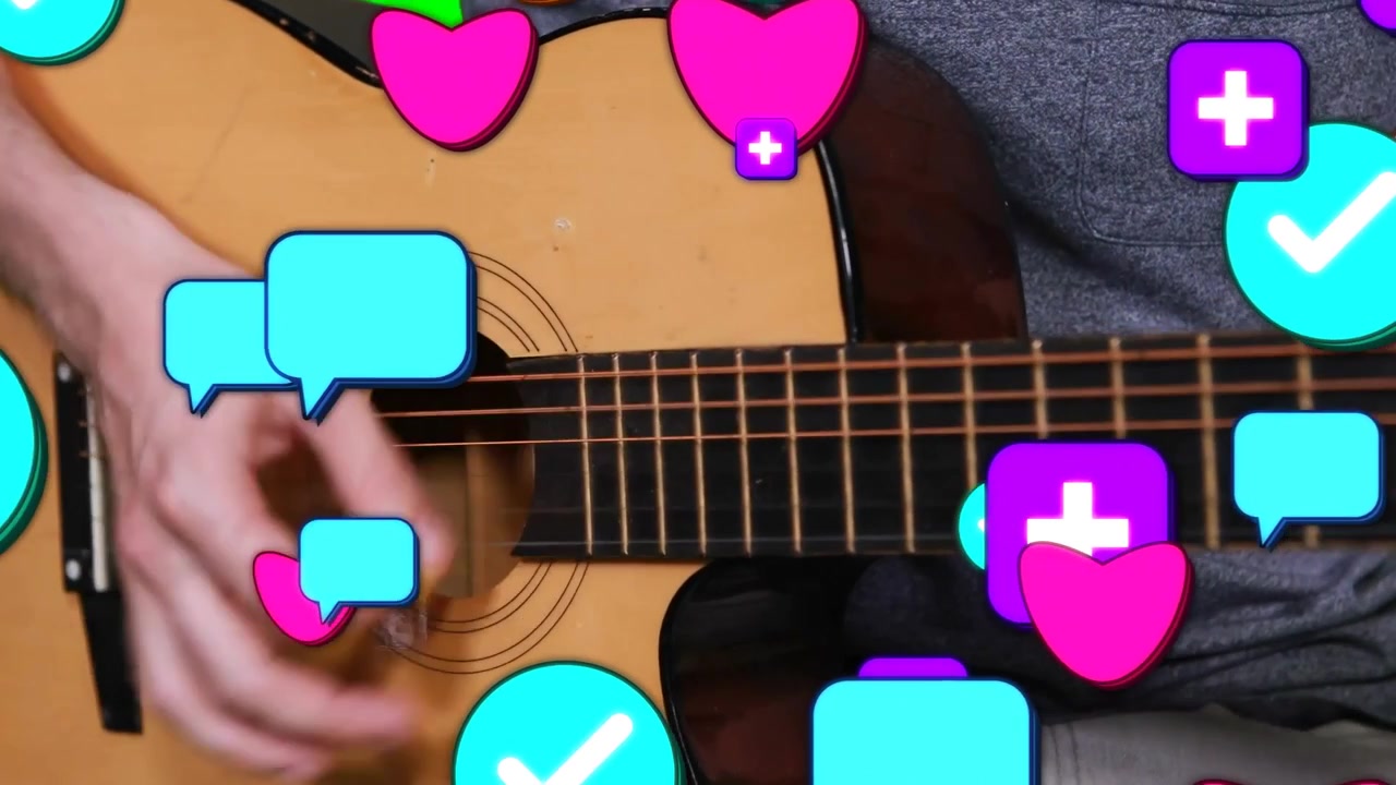 Right hand picking strumming acoustic guitar in studio in gray shirt icons popping seeking likes