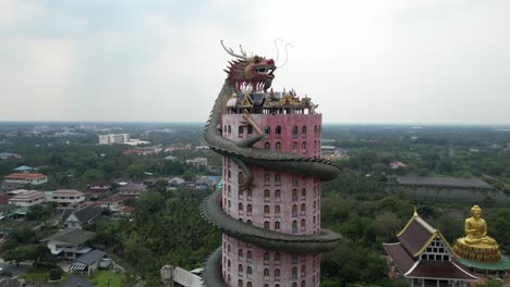 aerial-drone-view-of-buddhist-Dragon-Temple,-Wat-Sam-Phran-near-Bangkok-Thailand