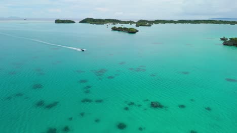 zodiac from expedition cruise ship visiting remote island in fiji