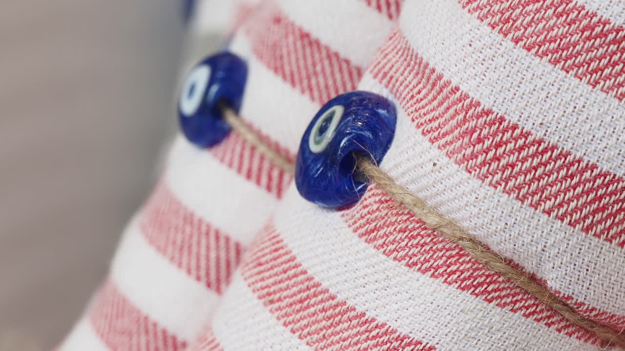 Red and White Striped Turkish Towels with Evil Eye Beads