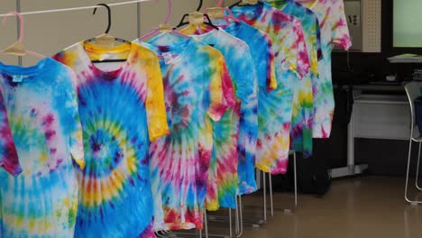 homemade tie-dye shirts hanging to dry