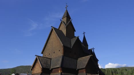 historic norwegian heddal stave wooden church on clear blue sky sunny day