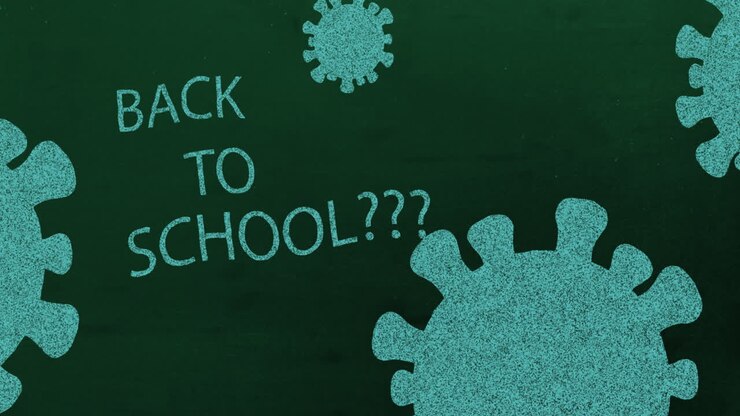 Animation of Back to School??? text with green coronavirus cells moving.