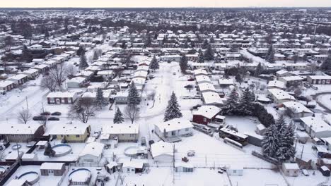 snow-covered suburban neighborhood in st-constant, québec, viewed from above