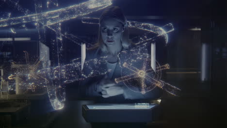 woman interacting with futuristic holographic data display