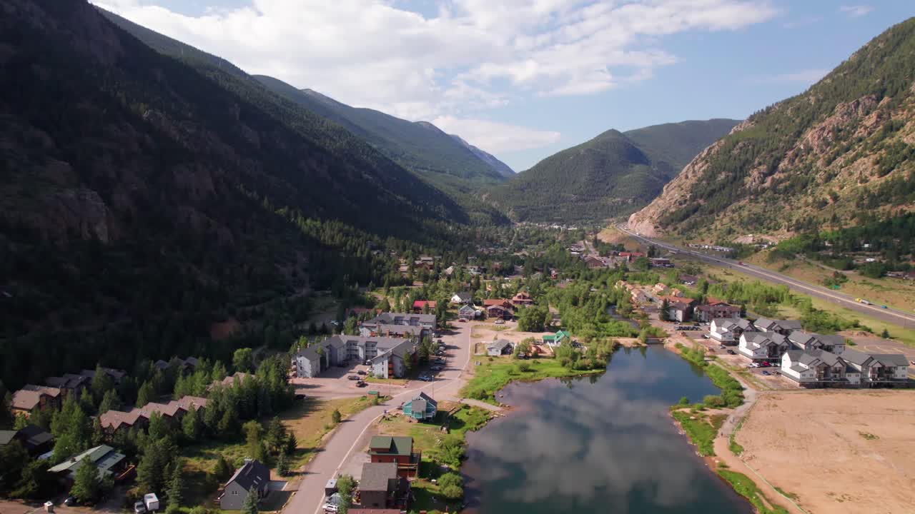 Aerial overview of Georgetown, Colorado. Camera is flying over Georgetown Lake and the city of Georgetown in Colorado.