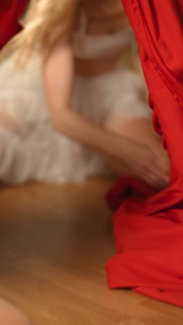 contemporary dance performance with red and white cloth