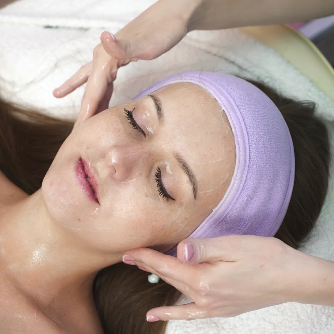 Woman during facial massage