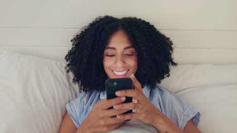 Phone,-happy-woman-and-bed-of-a-young-female