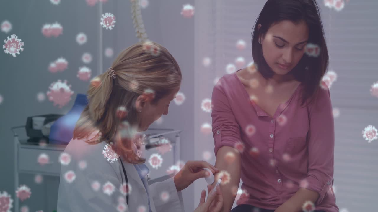 여성 의사가 백신을 접종하는 코로나 세포의 애니메이션