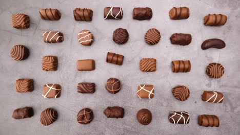 different shapes of chocolates moving - stop motion