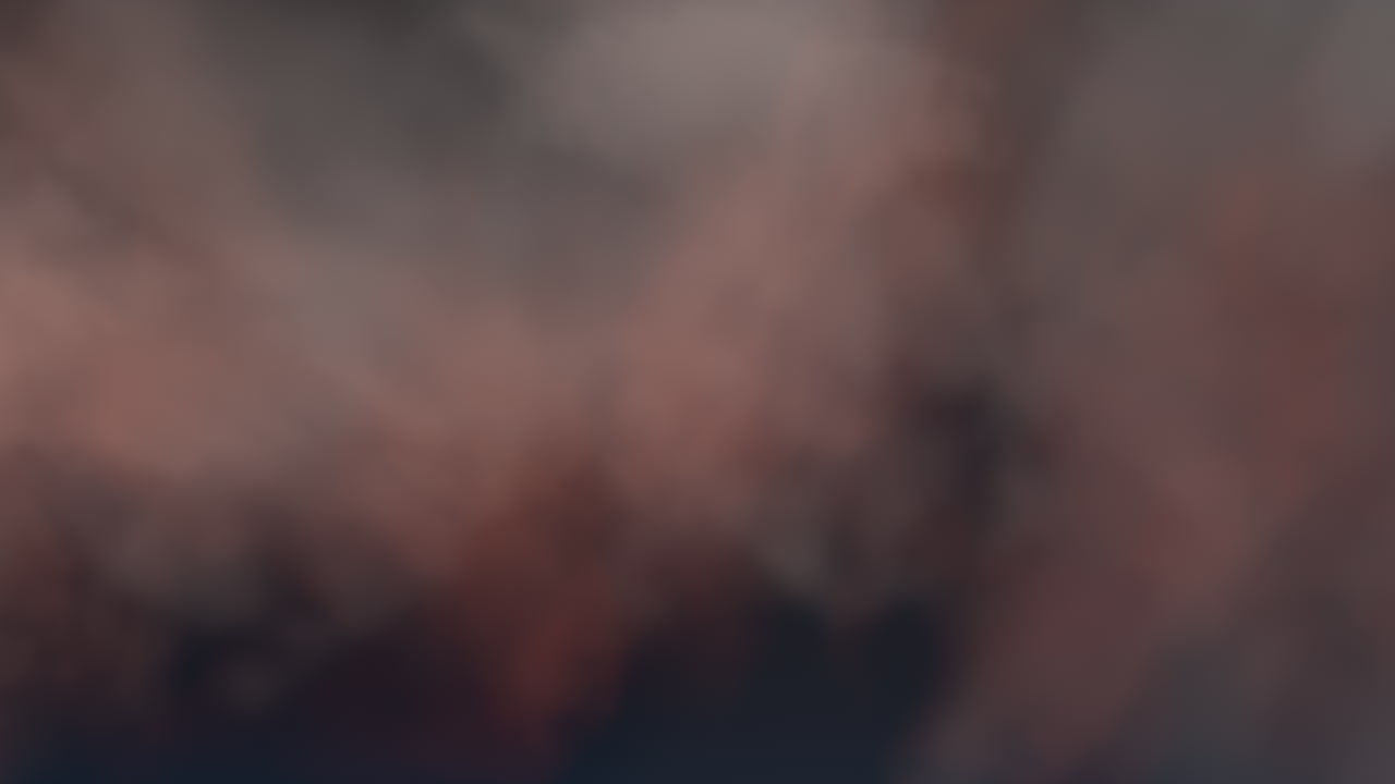 Vibrant sunset sky with colorful clouds and bright sun