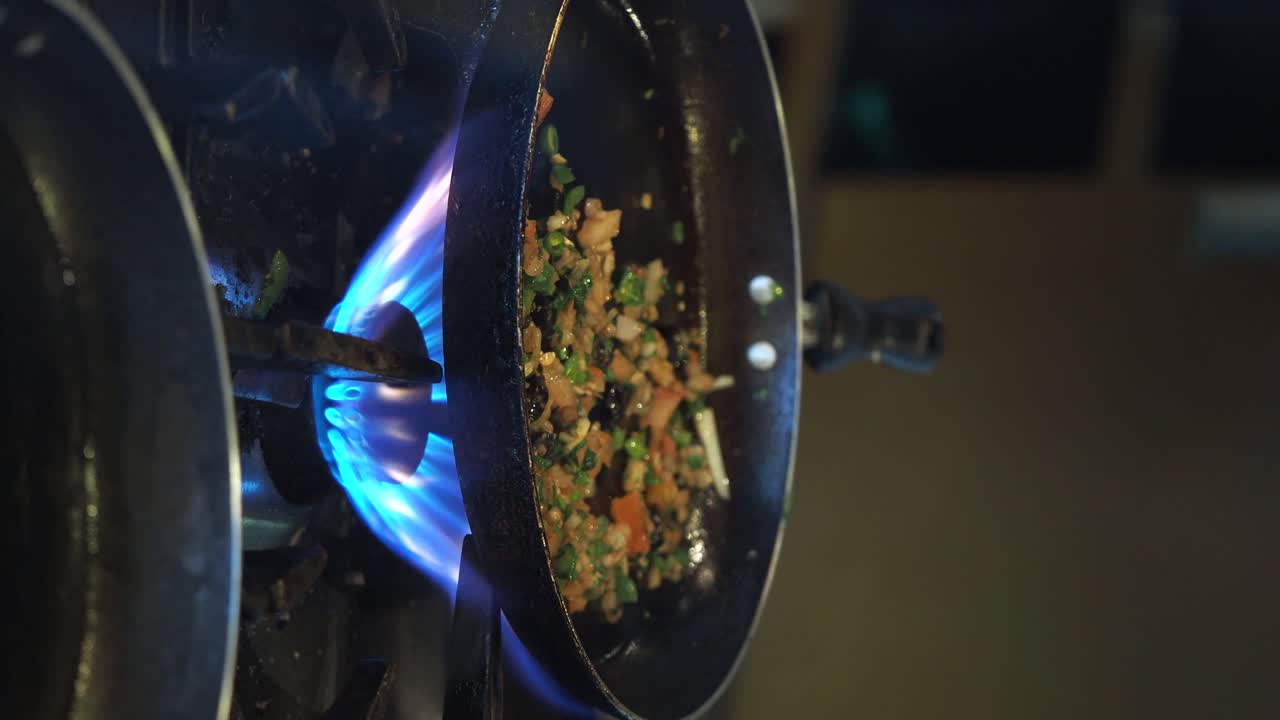 Cooking in a pan on a gas stove