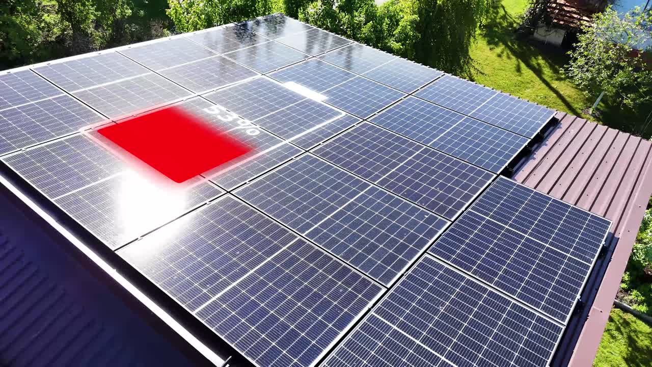 Battery charge icon on top of solar panels, aerial orbit view