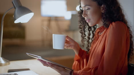 Remote-work,-tablet-and-woman-designer-drinking