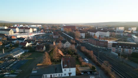 ice train driving twoards drone on high speed tracks