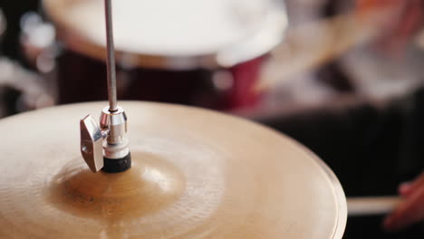 the drummer strikes with his chopsticks close-up hd video