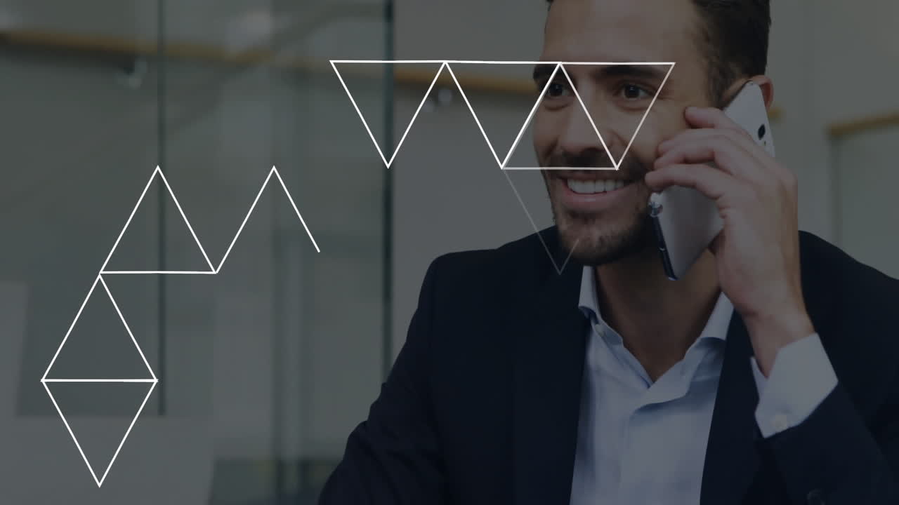 Man holding smartphone and speaking in modern business office, featuring animated triangle overlays
