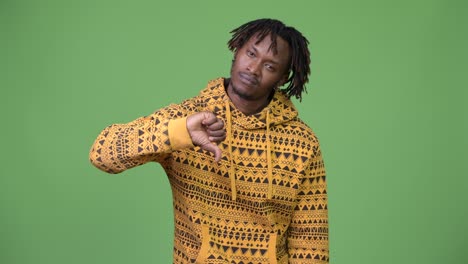 young sad african man giving thumbs down