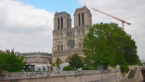 building of notre-dame de paris cathedral in paris, france under restoration after fire destruction