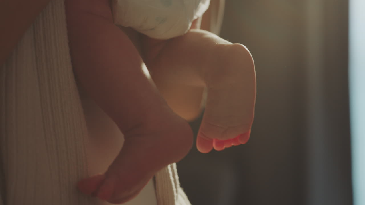 Baby's Feet in a Sling