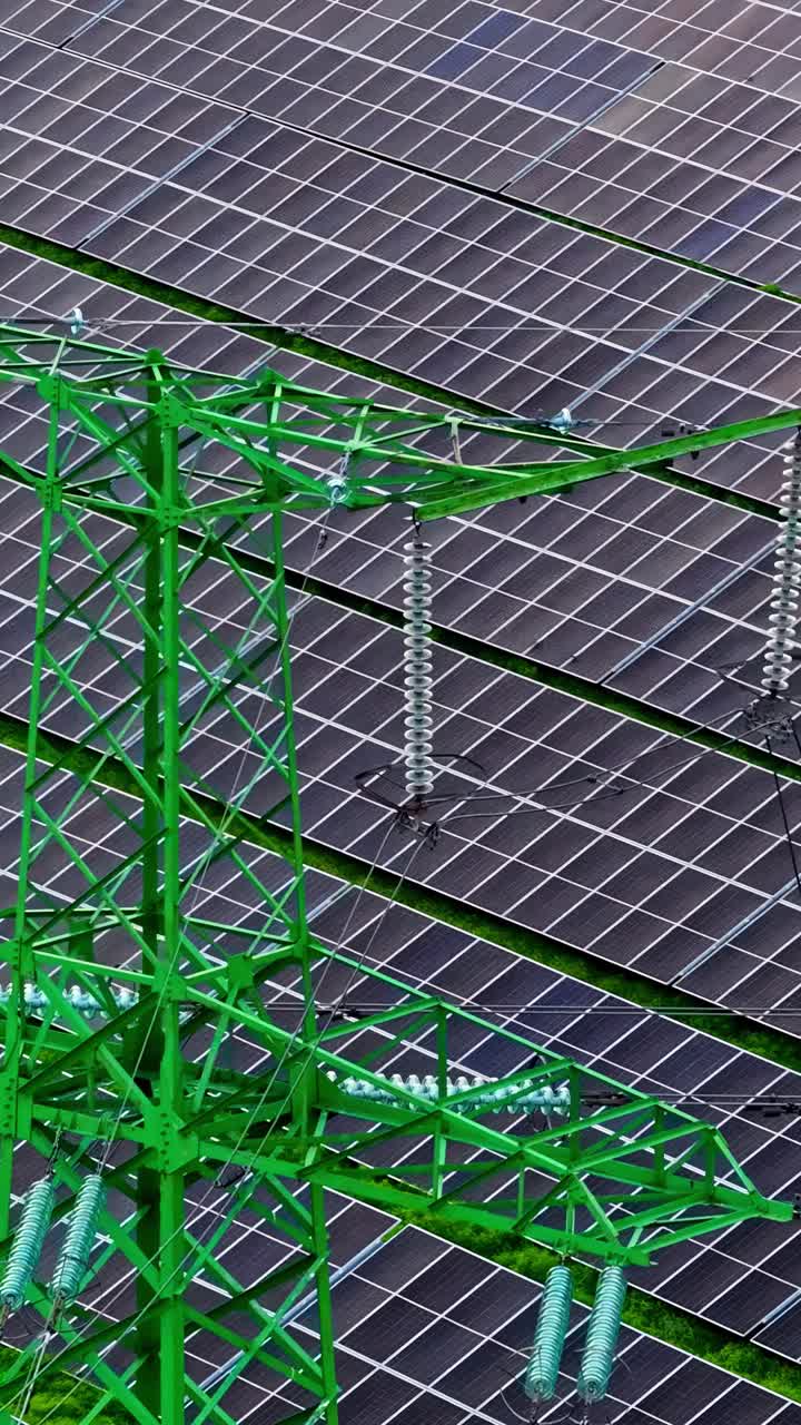 Solar panels and green power lines capture renewable energy on a sunny day