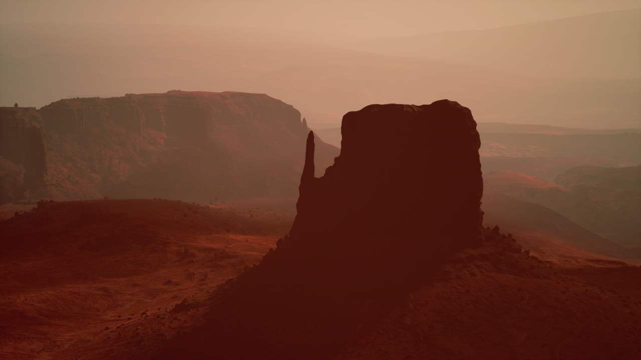 Solnedgang ved søstrene i Monument Valley