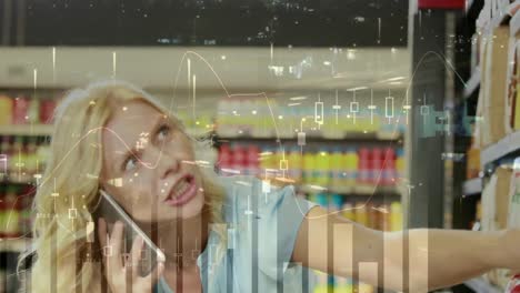 animation of data processing over smiling caucasian woman talking on smartphone in shop