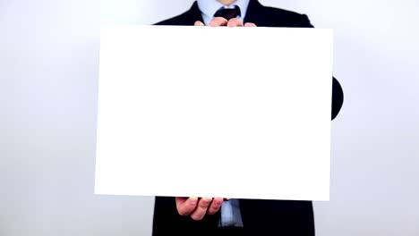 Businessman-Presenting-And-Showing-Your-Text-Or-Product-On-White-Placard-1