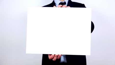 businessman presenting and showing your text or product on white placard 1