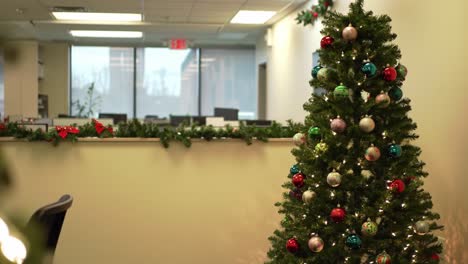 a festive office scene showcasing a beautifully decorated christmas tree, complete with colorful ornaments and twinkling lights, creating a cheerful holiday atmosphere
