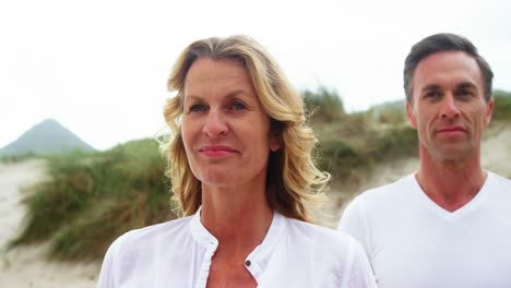 mature couple together at beach