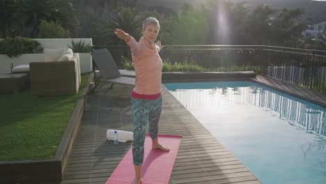 Senior-woman-outdoor-yoga-fitness