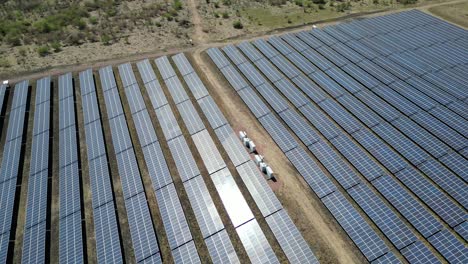 Aerial drone view of solar energy facility, renewable power, eco friendly infrastructure