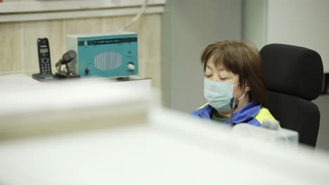 woman working in a control room