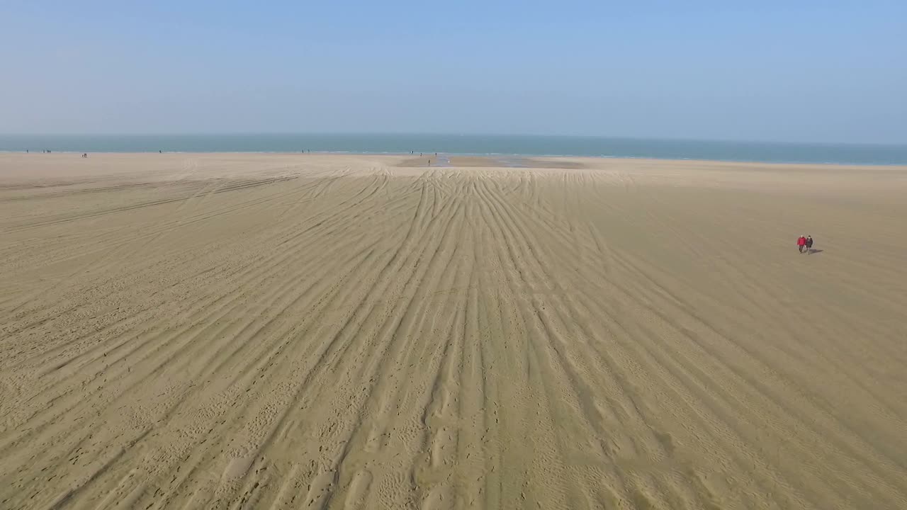 A vast beach landscape with ocean views