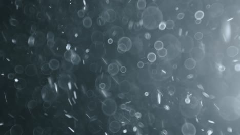 bokeh de partículas abstractas flotantes sobre fondo oscuro