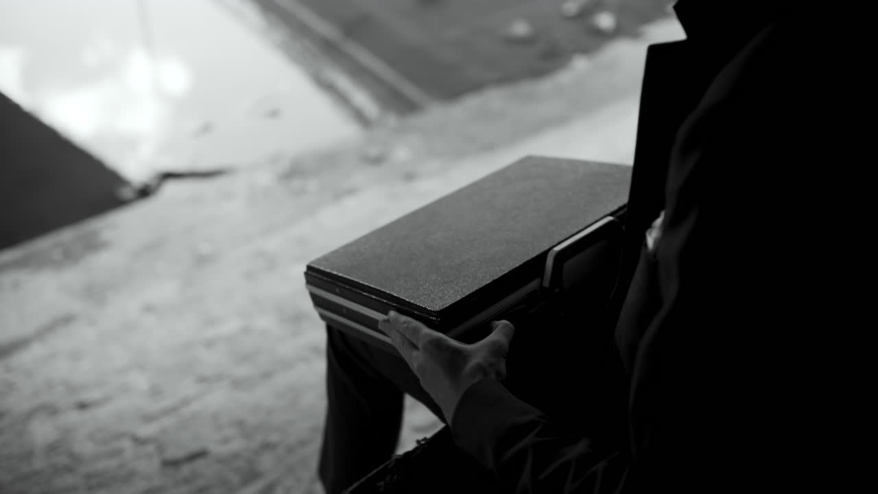 Man in Suit with Briefcase