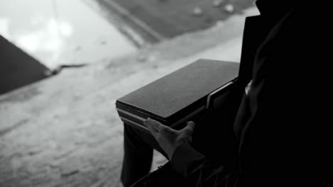 man in suit with briefcase