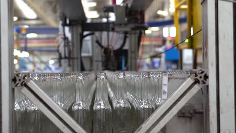 automatic glass bottle washing machine in a factory