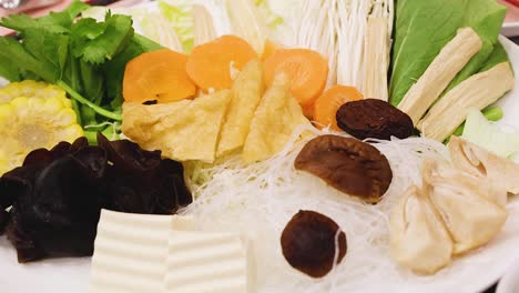 assorted vegetables and tofu for hotpot meal