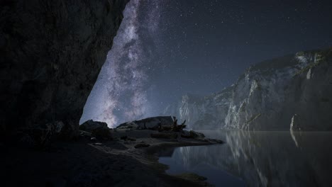 hyperlapse of night starry sky with mountain and ocean beach in lofoten norway