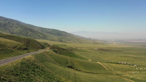 aerial flight along an empty road along the foothills of the tehachapi mountains