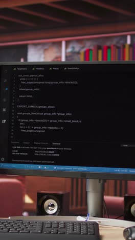 Vertical video Code on computer display in apartment used for fixing errors in applications
