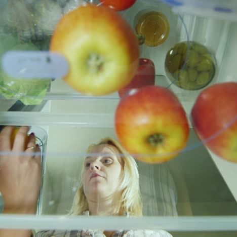 woman makes an easy fruit snack