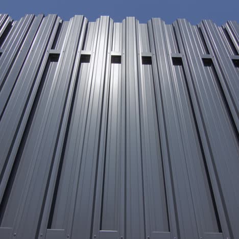 A-fence-made-of-grey-metal-1