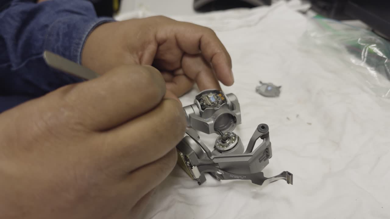 Specialized technical personnel, repairing drone cameras