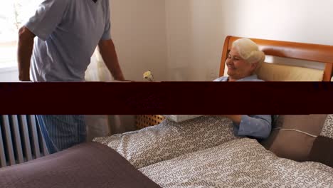 senior man serving breakfast to senior woman