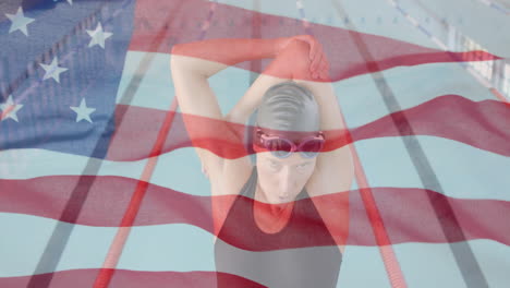 animation of flag of usa over caucasian female swimmer